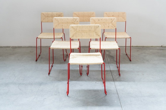 Image 1 of Design italiano scultoreo e sorprendente: sedie da pranzo in ferro rosso acceso e paglia naturale