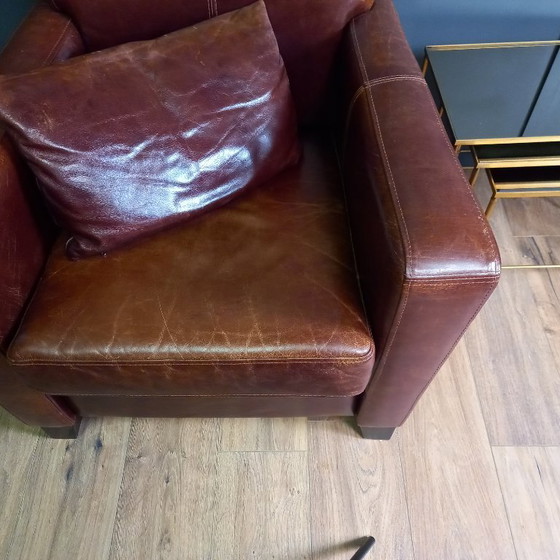 Image 1 of Timeless cowhide leather club armchair, atmospheric and inviting.