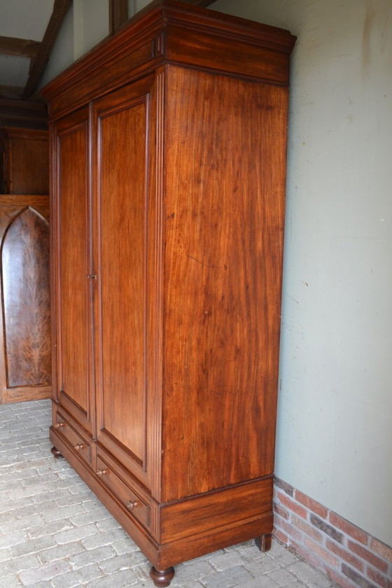Image 1 of Sleek antique mahogany cabinet.