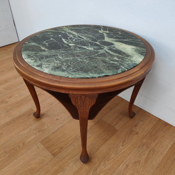 Image 1 of Vintage round wooden coffee table with onyx marble top