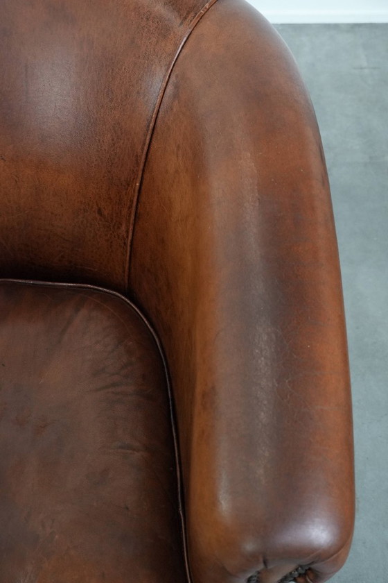 Image 1 of 2 x Fauteuil club intemporel en peau de mouton