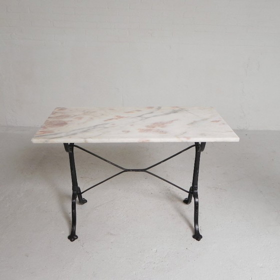Image 1 of Table de bistrot avec plateau en marbre sur piètement en fonte, PARIS, années 1930
