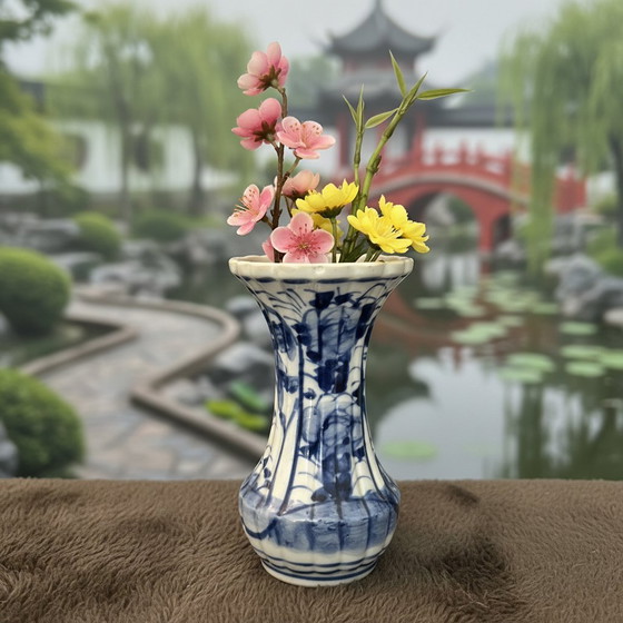 Image 1 of Complete set of 11 antieke Japanse  blauw witte imari vazen , formaten tussen de 12 en 32cm