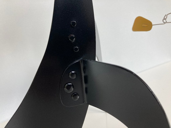 Image 1 of 5 Yellow And 1 Blue on a black stabile