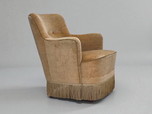 Poltrona danese, anni '70, in velluto verde chiaro.