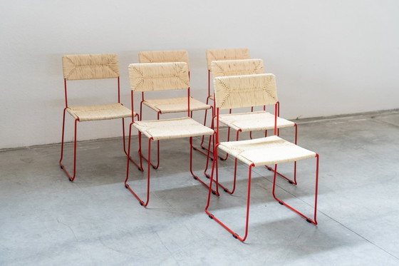 Image 1 of Design italiano scultoreo e sorprendente: sedie da pranzo in ferro rosso acceso e paglia naturale