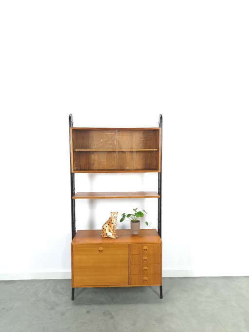 Teak Musterring design cabinet with black legs
