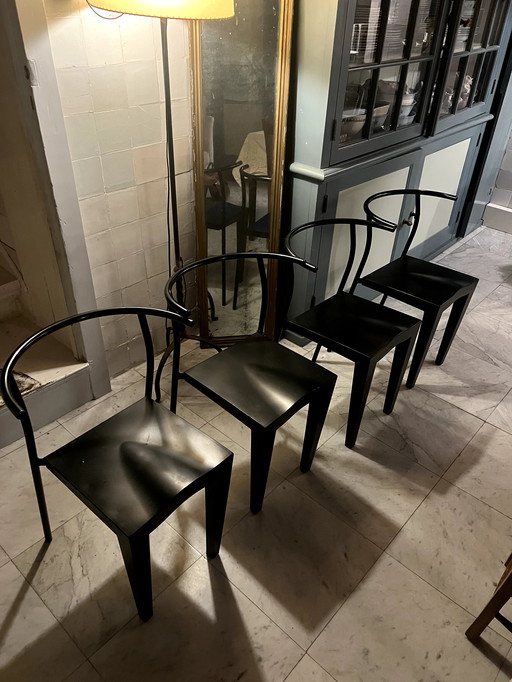 4 chaises noires Dr. Glob - Design by Philippe Starck