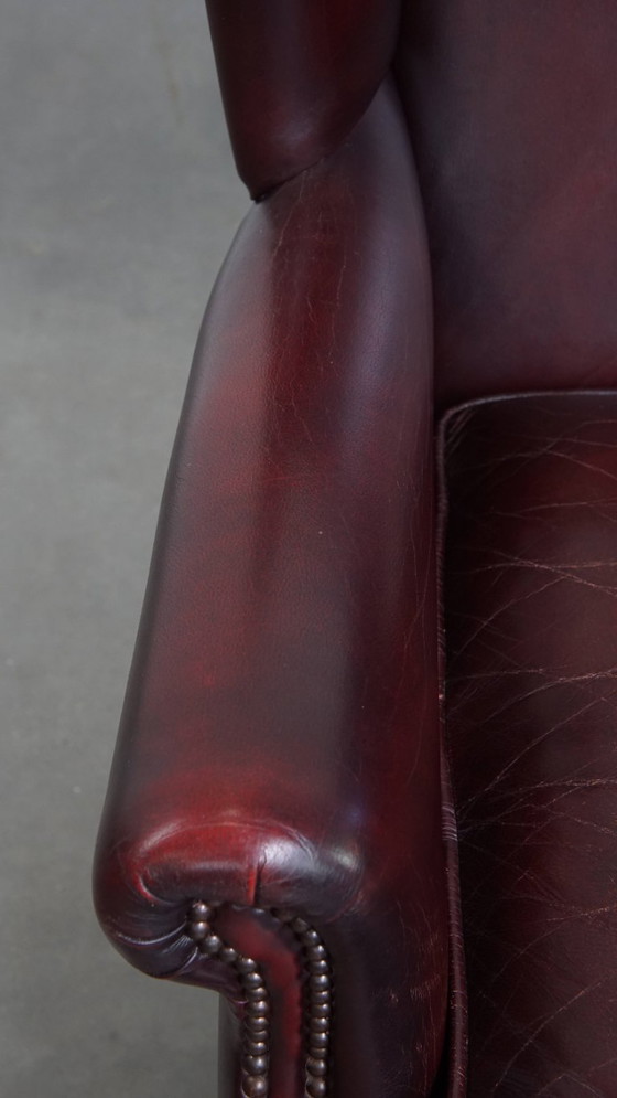 Image 1 of 2x Bordeauxrode rundleren oorfauteuils in Engelse stijl