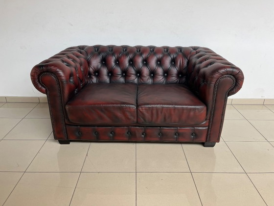 Image 1 of Chesterfield Sofa in Oxblood Leather – Fully Restored, Classic Design
