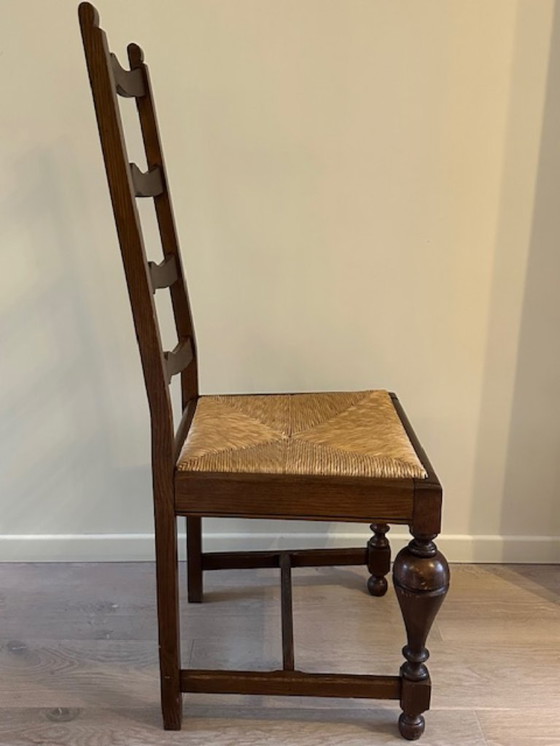 Image 1 of 2 grote + 6 kleine eiken stoelen