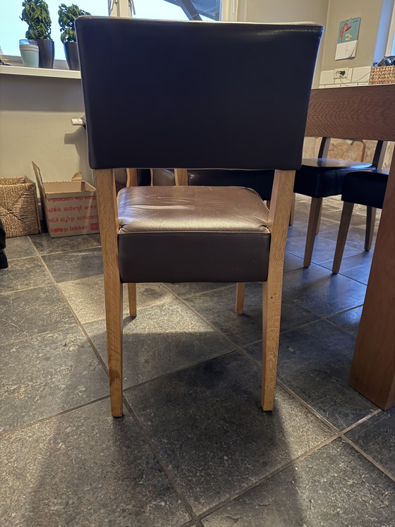 Image 1 of Wooden table with 8 chairs