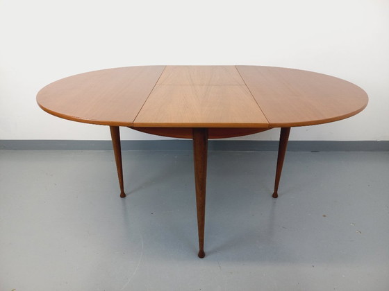 Image 1 of Vintage Scandinavian style round teak dining table from the 1950s/60s with extension