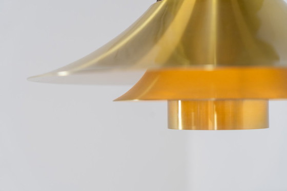 Image 1 of Lampada a sospensione color ottone di Frandsen (Danimarca, anni '70).