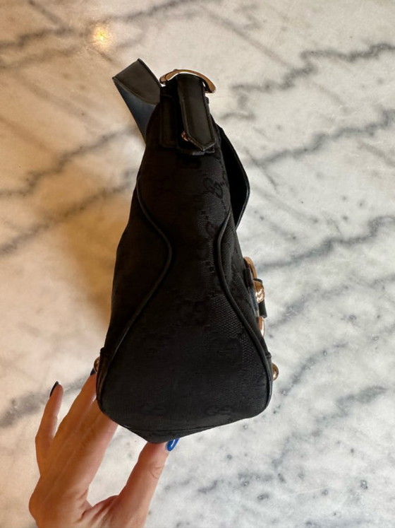 Image 1 of borsa con morsetto per cavalli