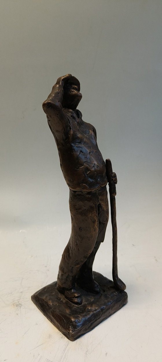 Image 1 of Image de sculpture en bronze et laiton représentant un golfeur, homme suivant