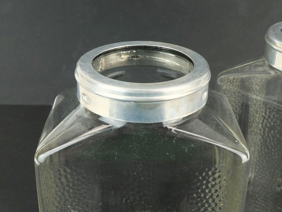 Image 1 of 2 grandes tarros de almacenamiento Poncet de la década de 1930 de vidrio prensado de aluminio de la era Bauhaus