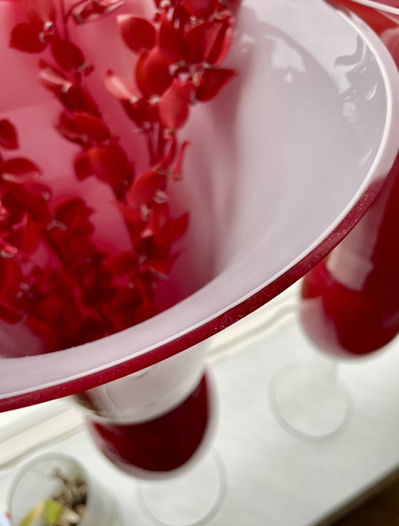 Image 1 of 2 red and white vases with 5 decorative branches made of glass
