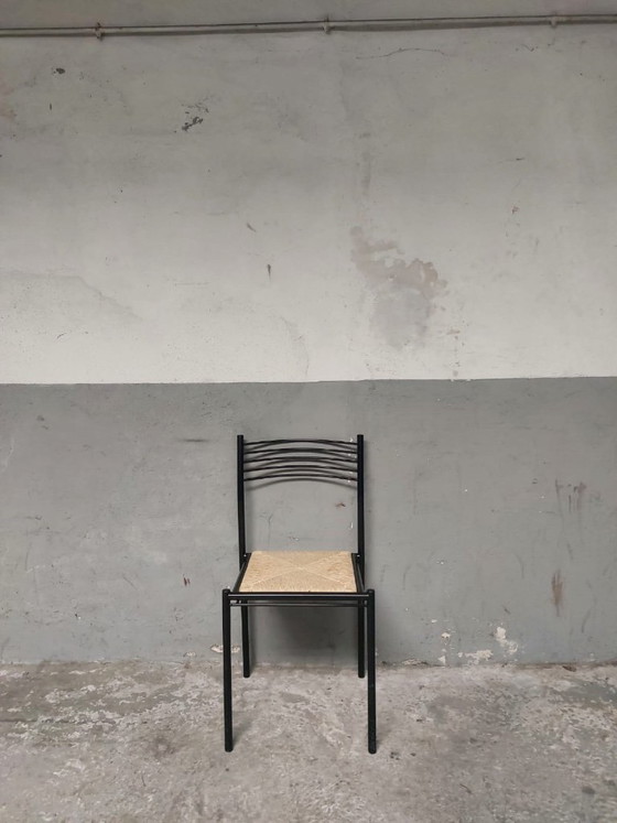 Image 1 of 4 chaises en métal avec assises en osier