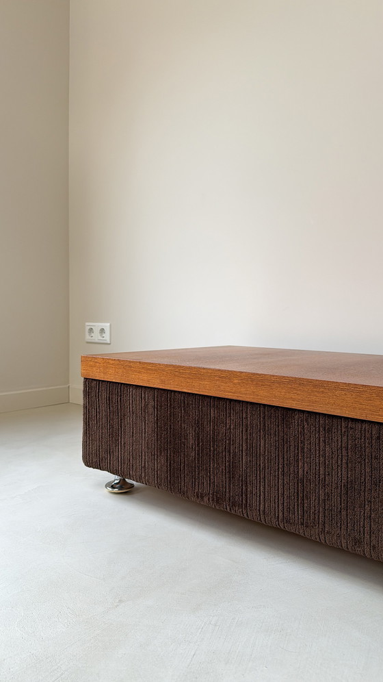 Image 1 of Coffee table with brown rub fabric, wooden top and chrome legs