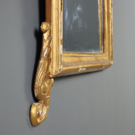 Image 1 of Miroir avec cadre en bois sculpté et doré