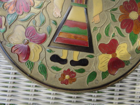 Image 1 of Mid century Enamelled Metal Folk Art Wall Plate - young girl and floral design - diam. 20 cm