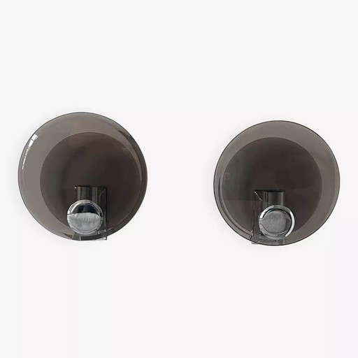 2 apliques de pared de cristal ahumado y metal cromado, Francia, 1970