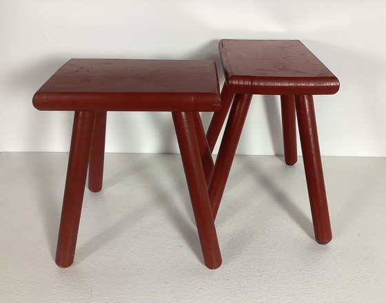 Image 1 of Two red vintage wooden stools side tables