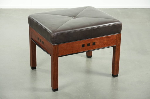 Chocolate brown cowhide Schuitema Art Deco design ottoman/footstool from the Decoforma series