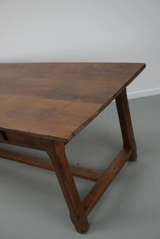 Image 1 of Early 20th-century French rustic country dining table made of oak and elm