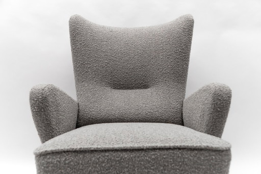 Poltrona con schienale alto in tessuto bouclé grigio, Italia, anni '50
