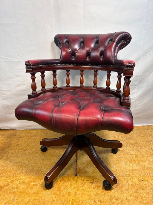Vintage Burgundy Leather Chesterfield Swivel Office Chair on Wheels  Add a touch of sophistication to your workspace with this v