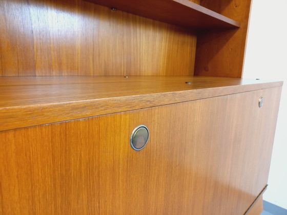 Image 1 of Louis Paolozzi's vintage modernist secretary bookcase for Monopoly in teak and metal from the 60s