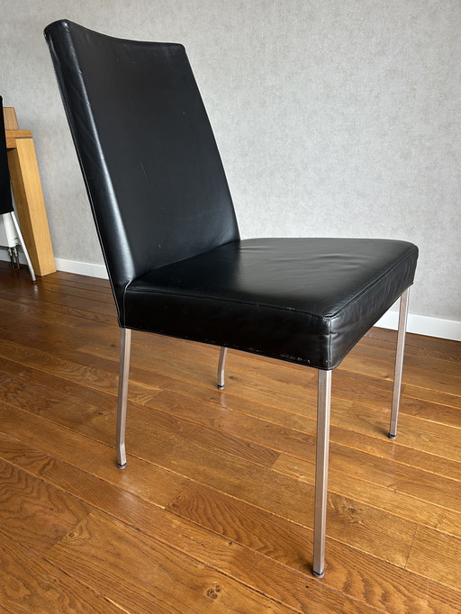 4 Black leather dining chairs