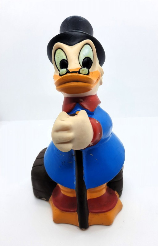 Vintage Disney uncle Dagobert piggy bank sitting on money box