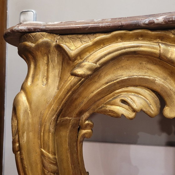 Image 1 of Consolle a muro, in legno intagliato e dorato, stile Luigi XV, XVIII secolo – Francia