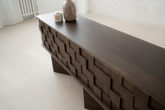Image 1 of The Noemi chest of drawers is raw, minimalistic and uncompromising in its form.