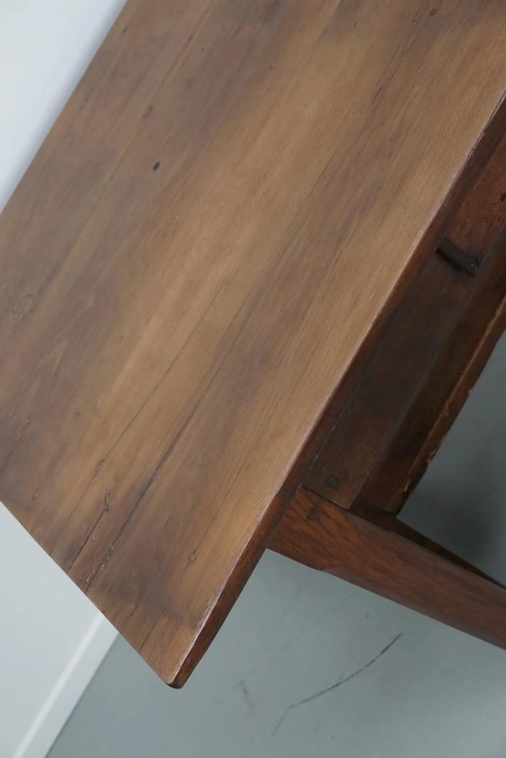 Image 1 of Early 20th-century French rustic country dining table made of oak and elm