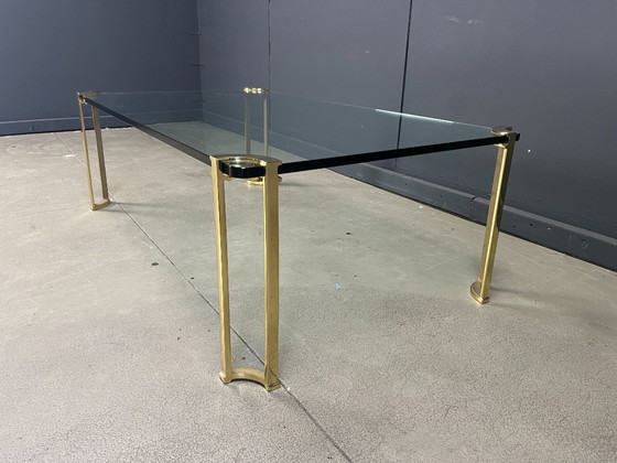 Image 1 of Salontafel in Peter Ghyczy-stijl, gemaakt van messing en glas.