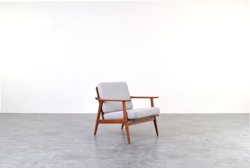 Dänischer Loungesessel aus Teakholz aus der Mitte des Jahrhunderts, 1960er Jahre.