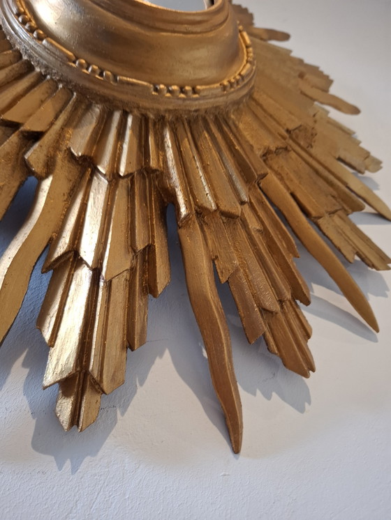 Image 1 of 46cm sun mirror in rare wood, 1950s version. Gold color.