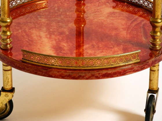 Image 1 of Round, small 1960s Aldo Tura serving or bar trolley in red goatskin leather | Made in Italy