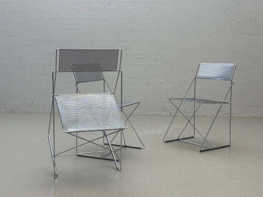 X-Line stoelen van Niels Jørgen Haugesen, jaren 70 – kuipstoelen, Metal