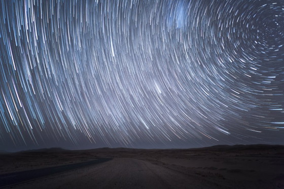 Image 1 of Night in Namib desert. Photograph 100x150cm. Star-trails, edition 2/3