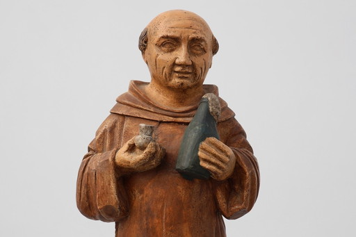 Figura pubblicitaria dello Champagne Dom Pérignon firmata J.L. Delaroche