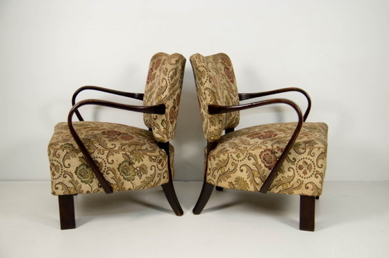 Image 1 of Een paar art deco fauteuils van gebogen hout met originele bloemenbekleding, circa jaren 1930.