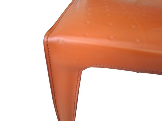 Image 1 of Set van 4 designstoelen in oranje leer en vintage ijzer.