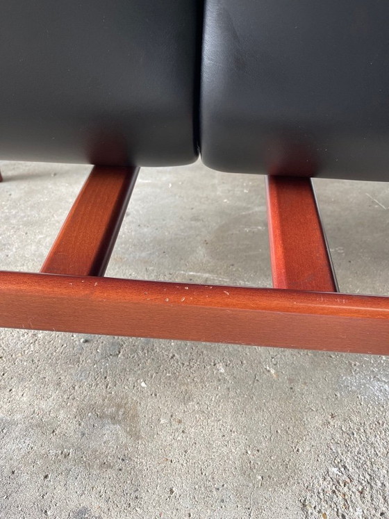 Image 1 of Vintage 2-seater lounge sofa — black leather & solid wood, Italy, 1970s–80s