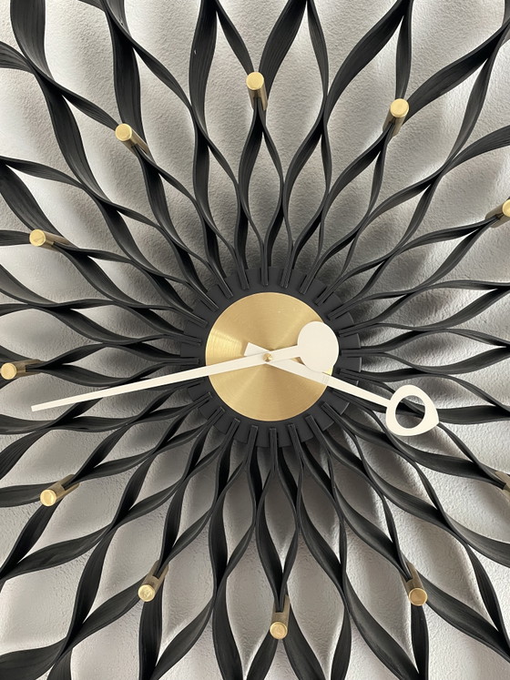 Vitra Sunflower Clock, an iconic design wall clock designed by George Nelson – Metal, Wood (photo 3 of 5)