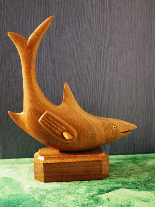 Decorative hand-carved vintage wooden shark figure on a base, circa 1960s